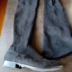 Over the knee flat boots
